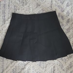 black pleated skirt